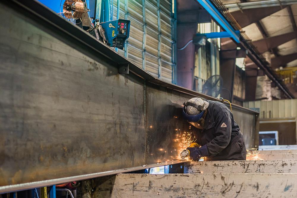 worker metal grinding
